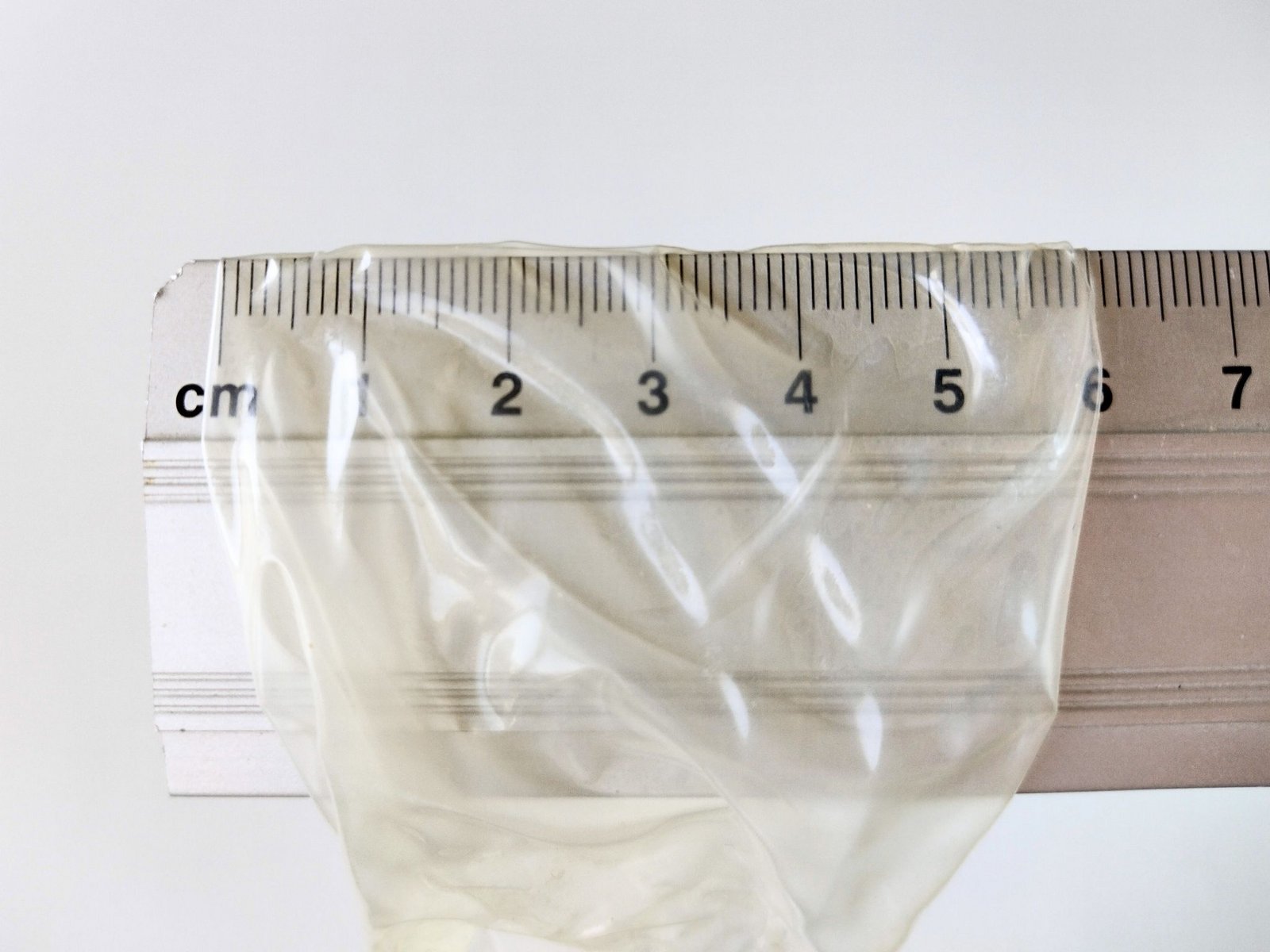Номінальна ширина презерватива, виміряна лінійкою
